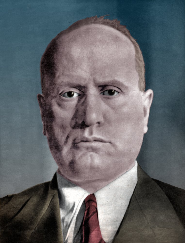 Benito Mussolini - . .