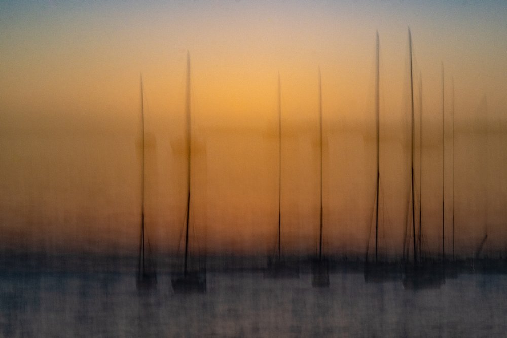 Voiliers au coucher de soleil, image floue - Franco Tessarolo