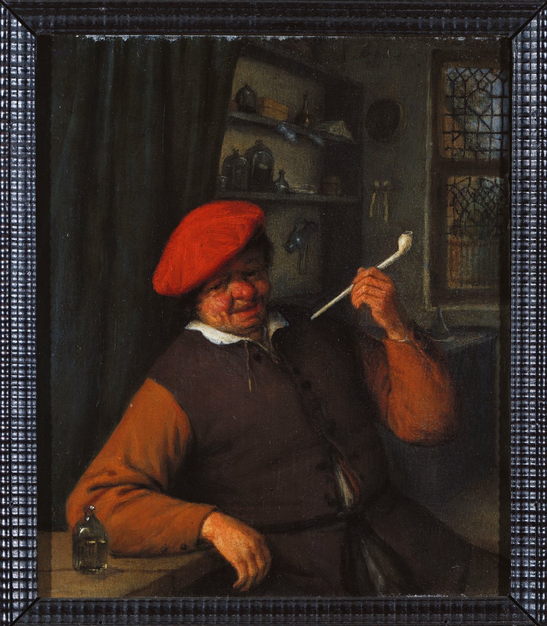 Un paysan en béret rouge fumant une pipe, à l