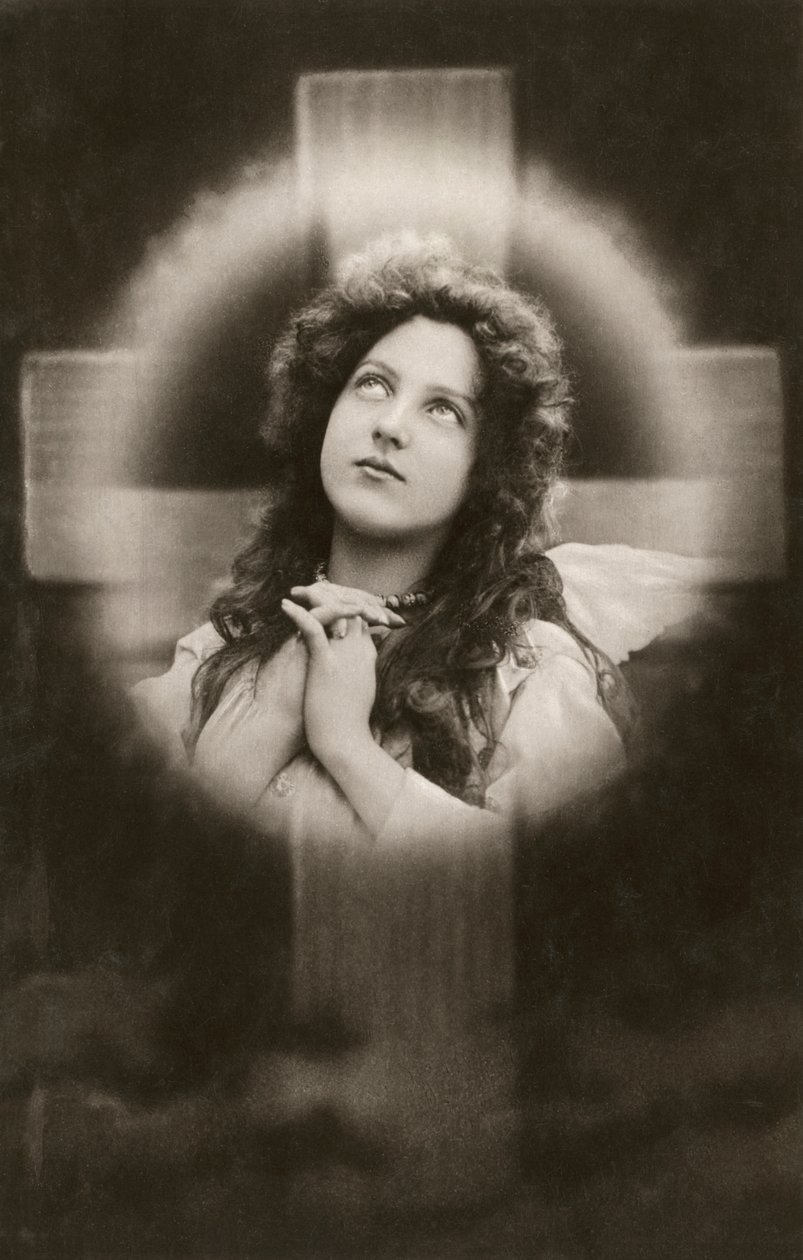 Femme dévote priant devant une croix - American School