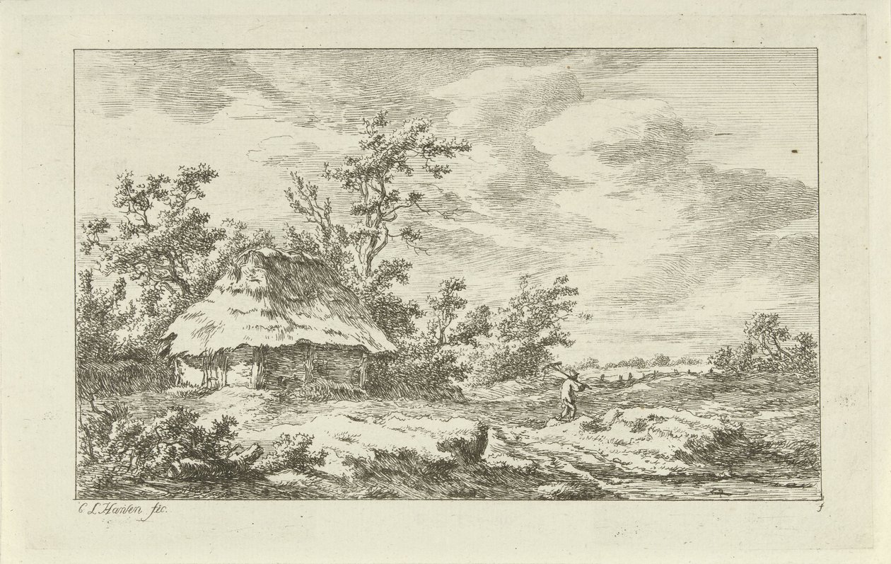 Homme avec un râteau près d