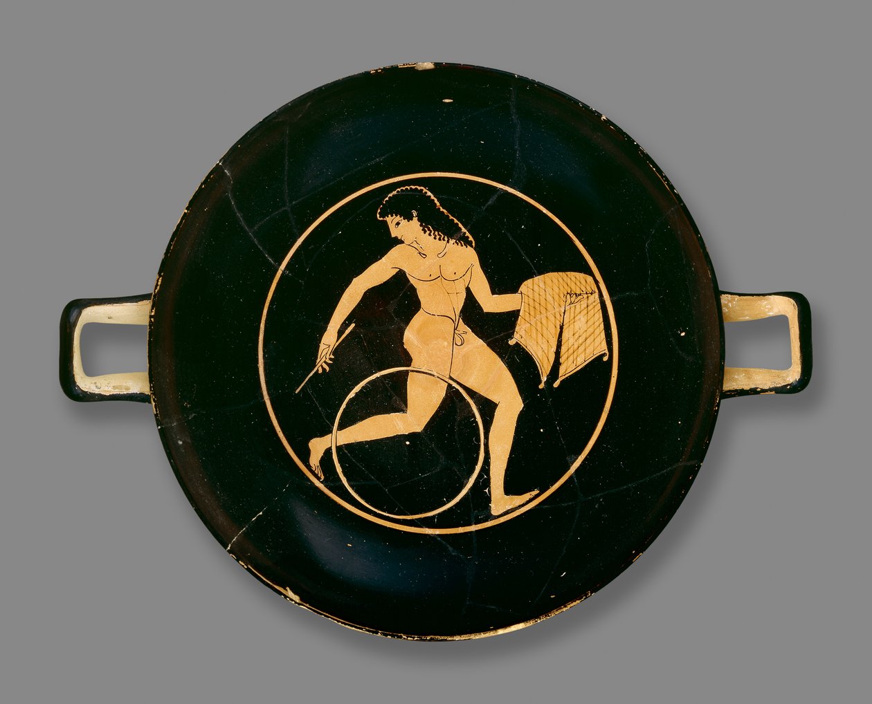 Coupe à figures rouges attiques décorée d