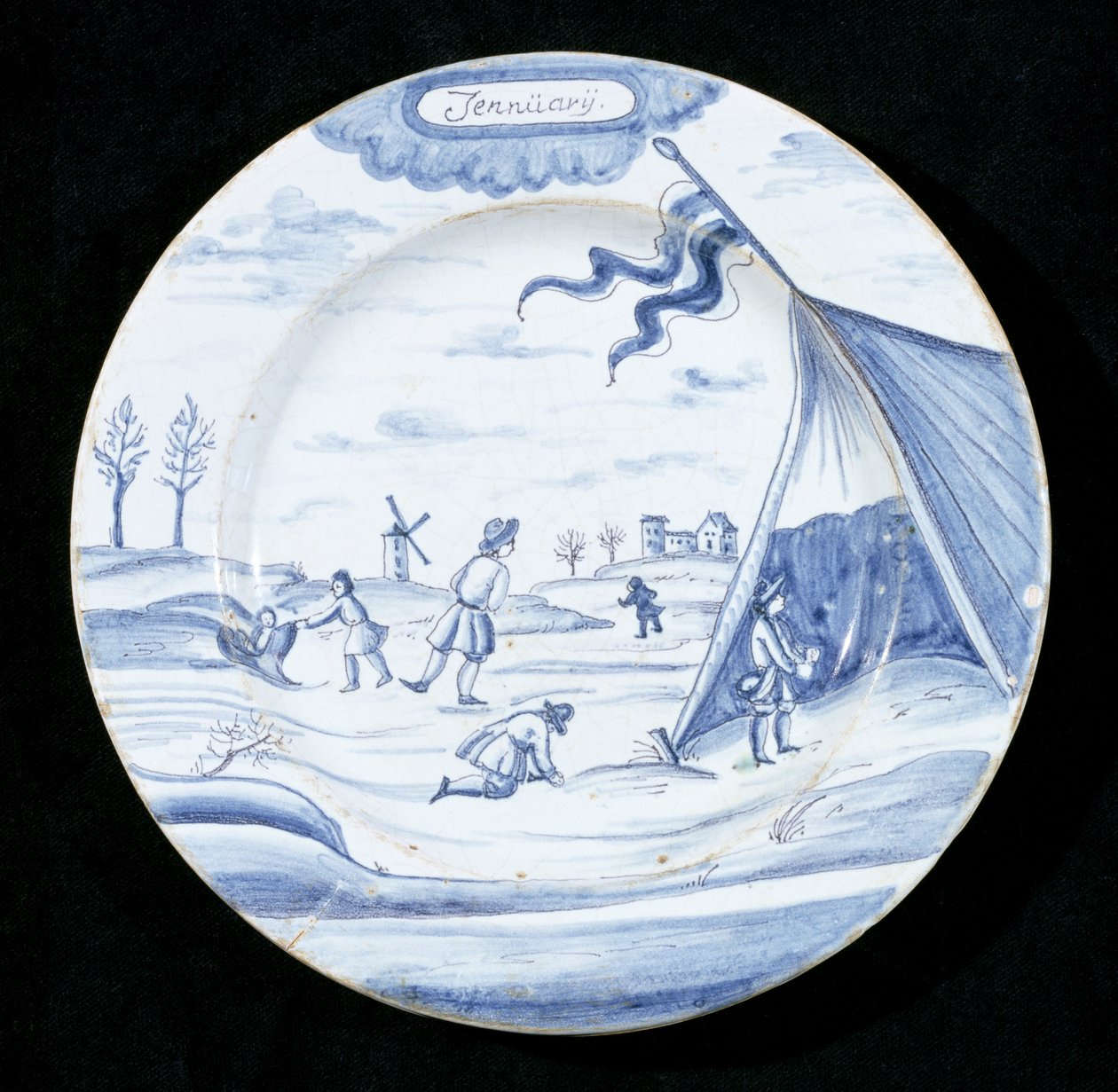 Assiette en faïence de Delft représentant le mois de janvier - Dutch School