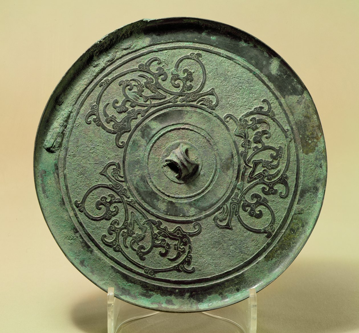 Miroir avec dragons entrelacés, Dynastie Zhou orientale, période des Royaumes combattants, 475-221 av. J.-C. - Eastern Zhou Dynasty Chinese School