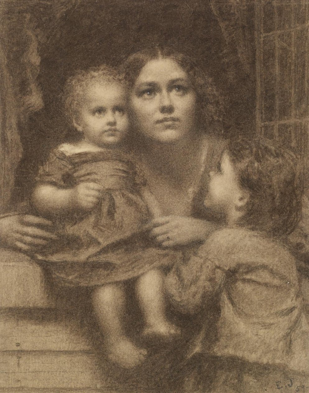 Une femme avec deux enfants près d