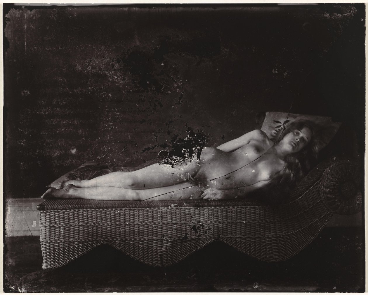 Femme nue sur une chaise longue en osier, La Nouvelle-Orléans - Ernest James Bellocq