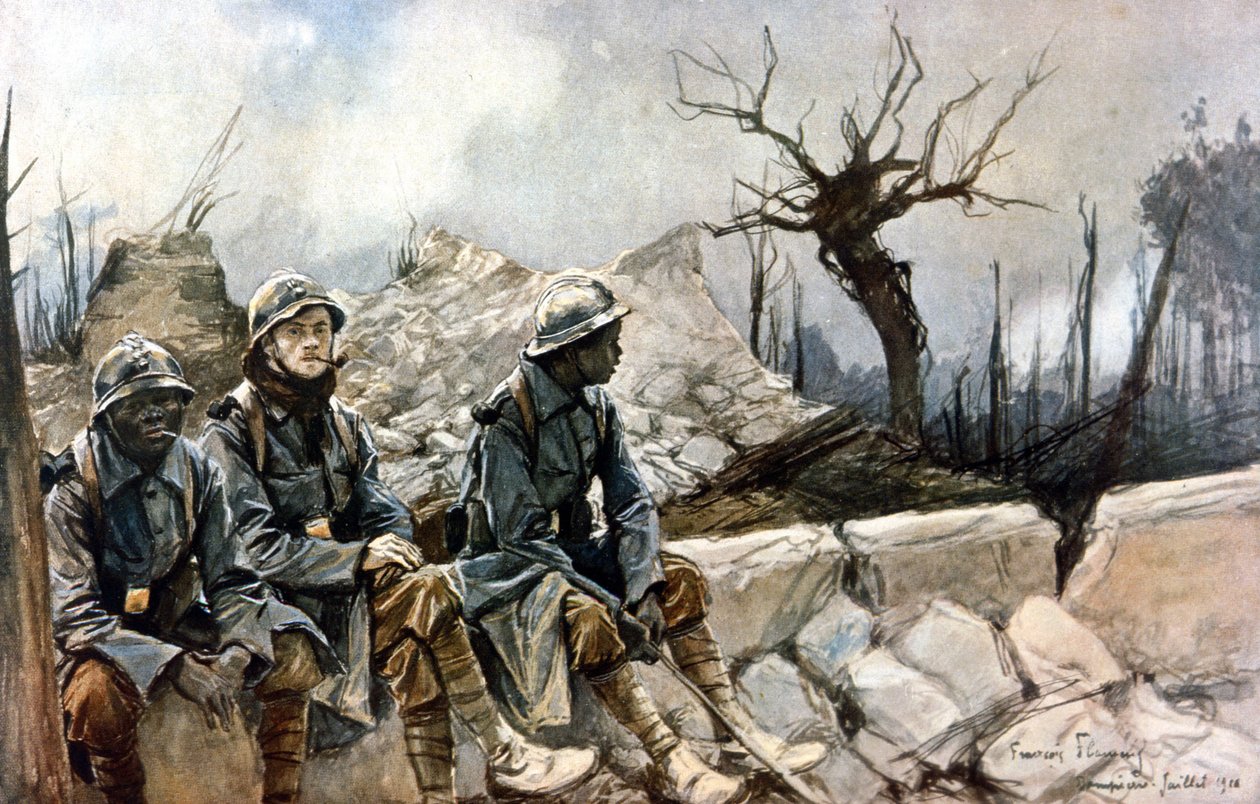 3 soldats français assis devant les ruines de l