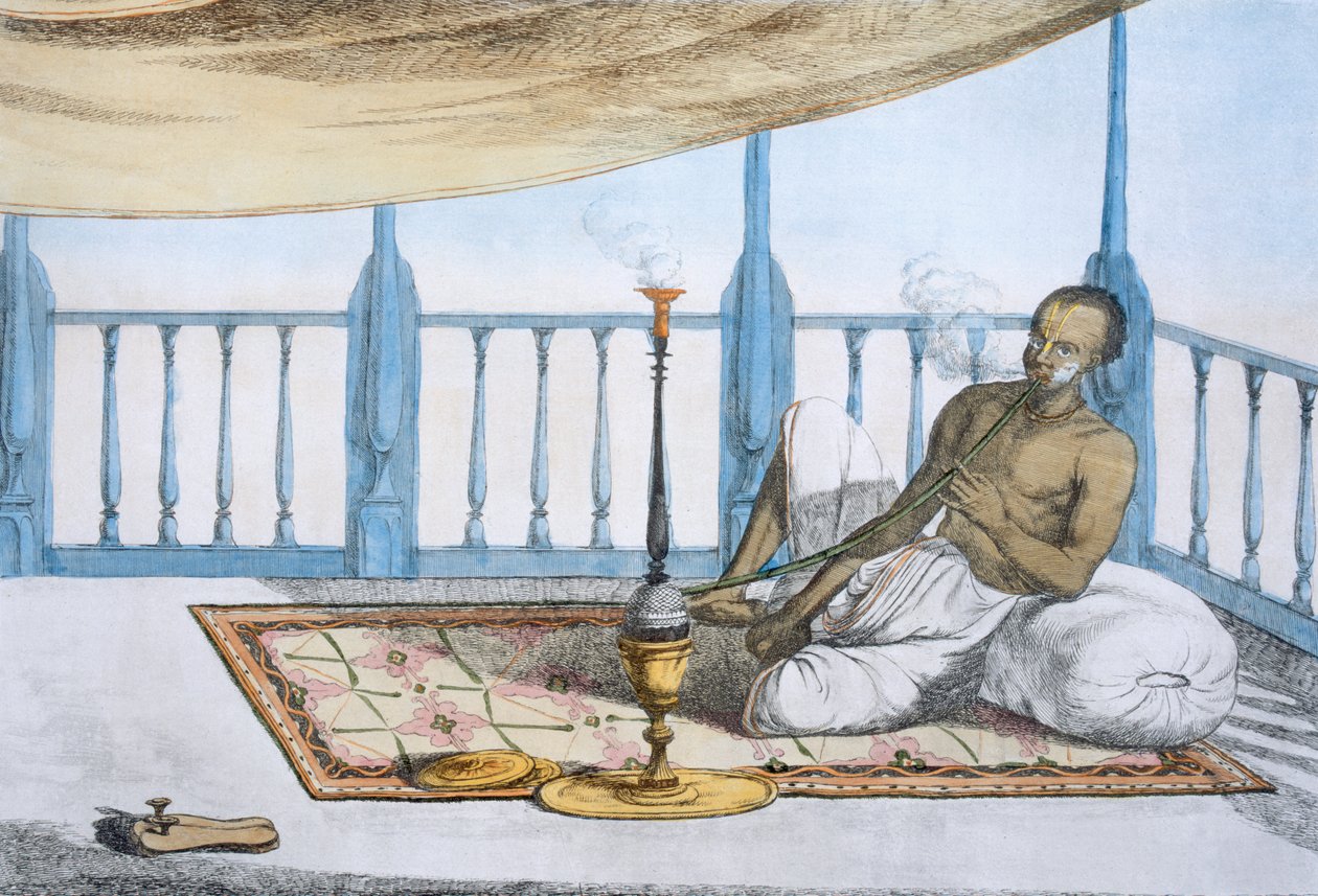 Homme fumant une chicha de haschich ou d
