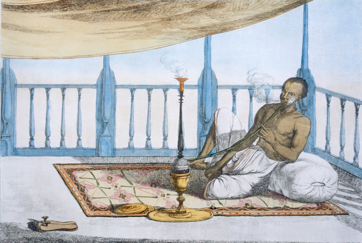 Homme fumant une chicha de haschich ou d