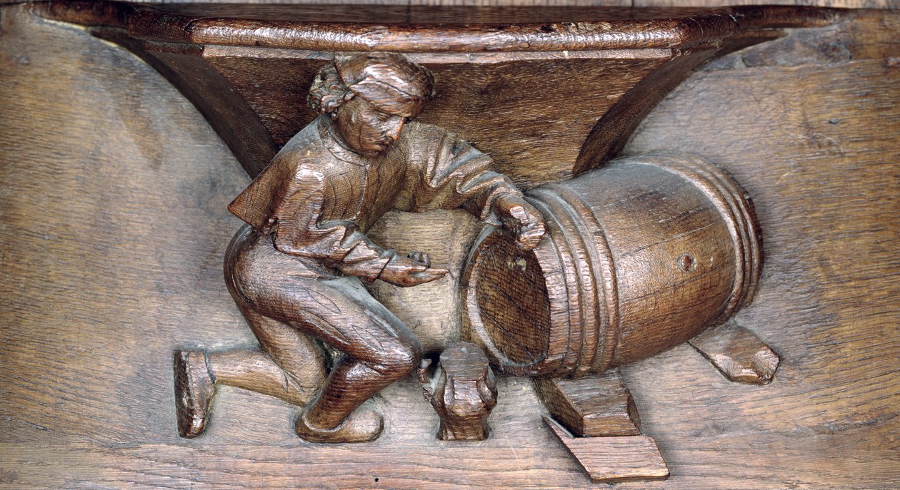 Sculpture représentant un homme mettant un robinet sur un tonneau, d