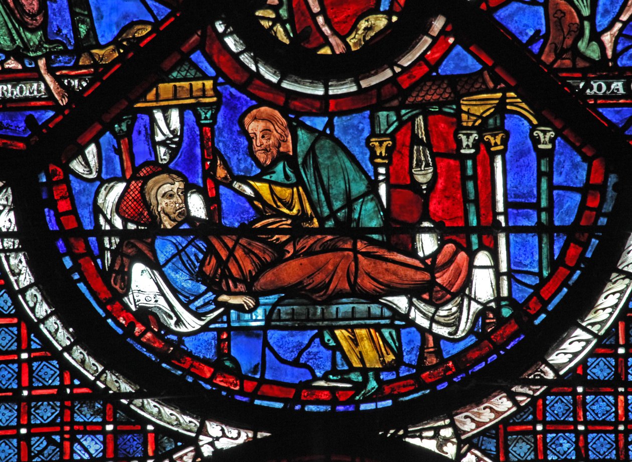 La fenêtre du Bon Samaritain : le Samaritain soigne l