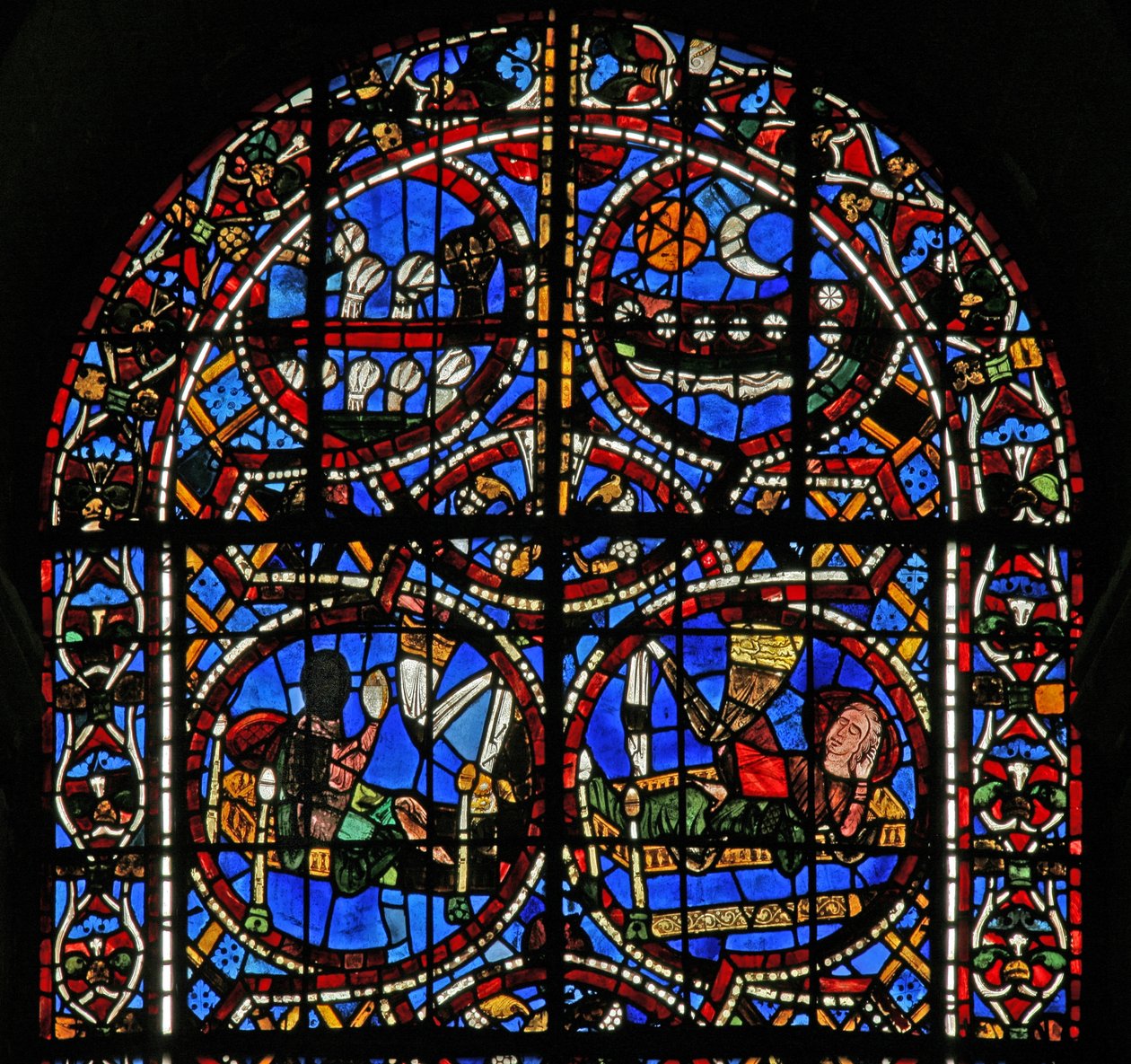 Fenêtre w11-R représentant le rêve de Joseph des soleils, lunes et gerbes de blé se prosternant devant sa gerbe - French School