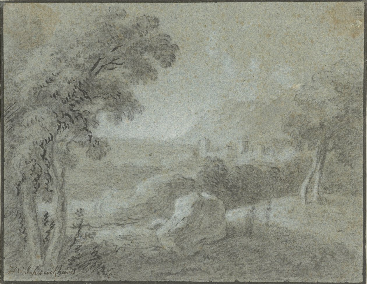 Paysage vallonné du sud avec une ville à l