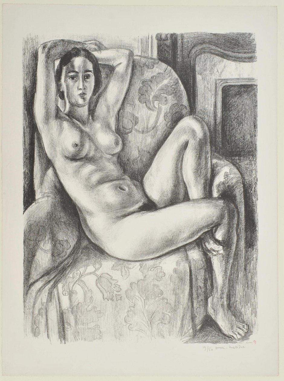 Nu au coussin bleu à côté d