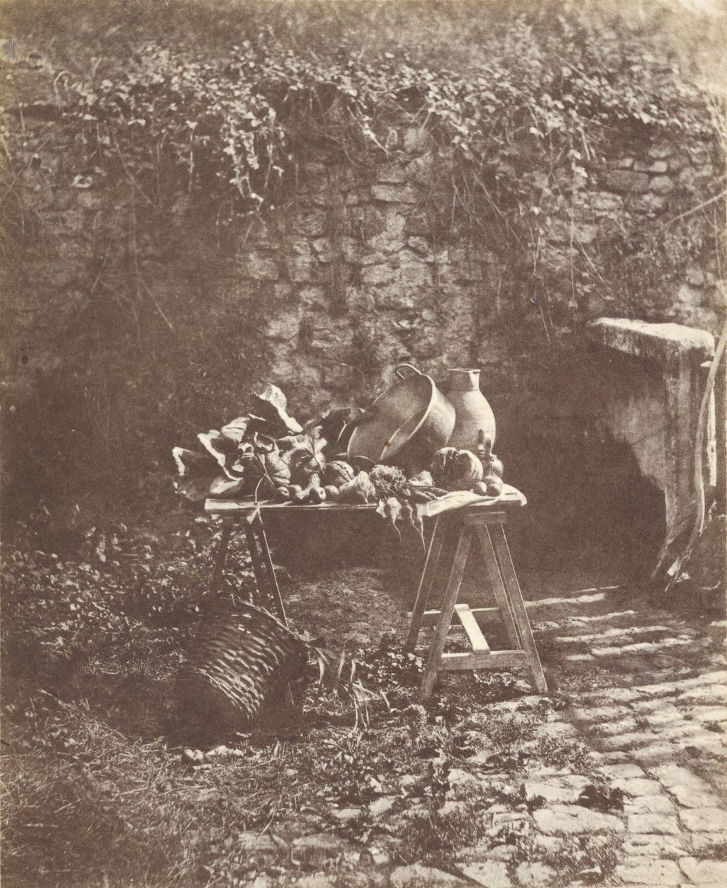[Nature morte: Chaudron, cruche et légumes sur une table à tréteaux] - Henri Victor Regnault