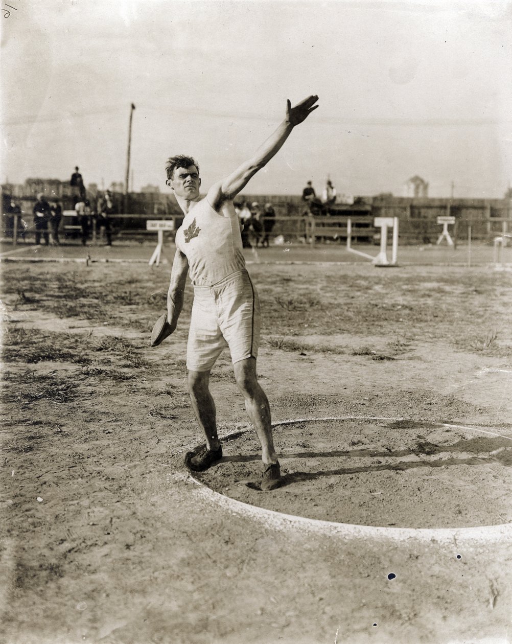 Martin Sheridan de la Greater New York Irish Athletic Association lançant le disque aux Jeux Olympiques de 1904 - Jessie Tarbox Beals