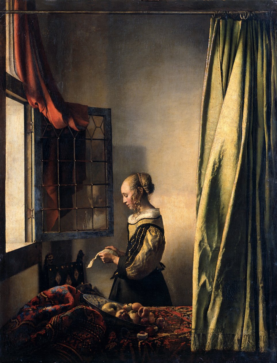Mädchen, das einen Brief am offenen Fenster liest - Johannes Vermeer