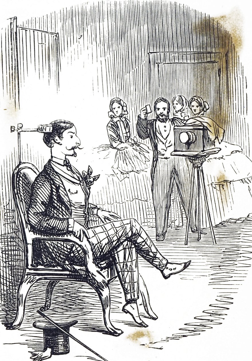 Caricature représentant une pince de tête utilisée pour maintenir le sujet du photographe immobile - John Tenniel
