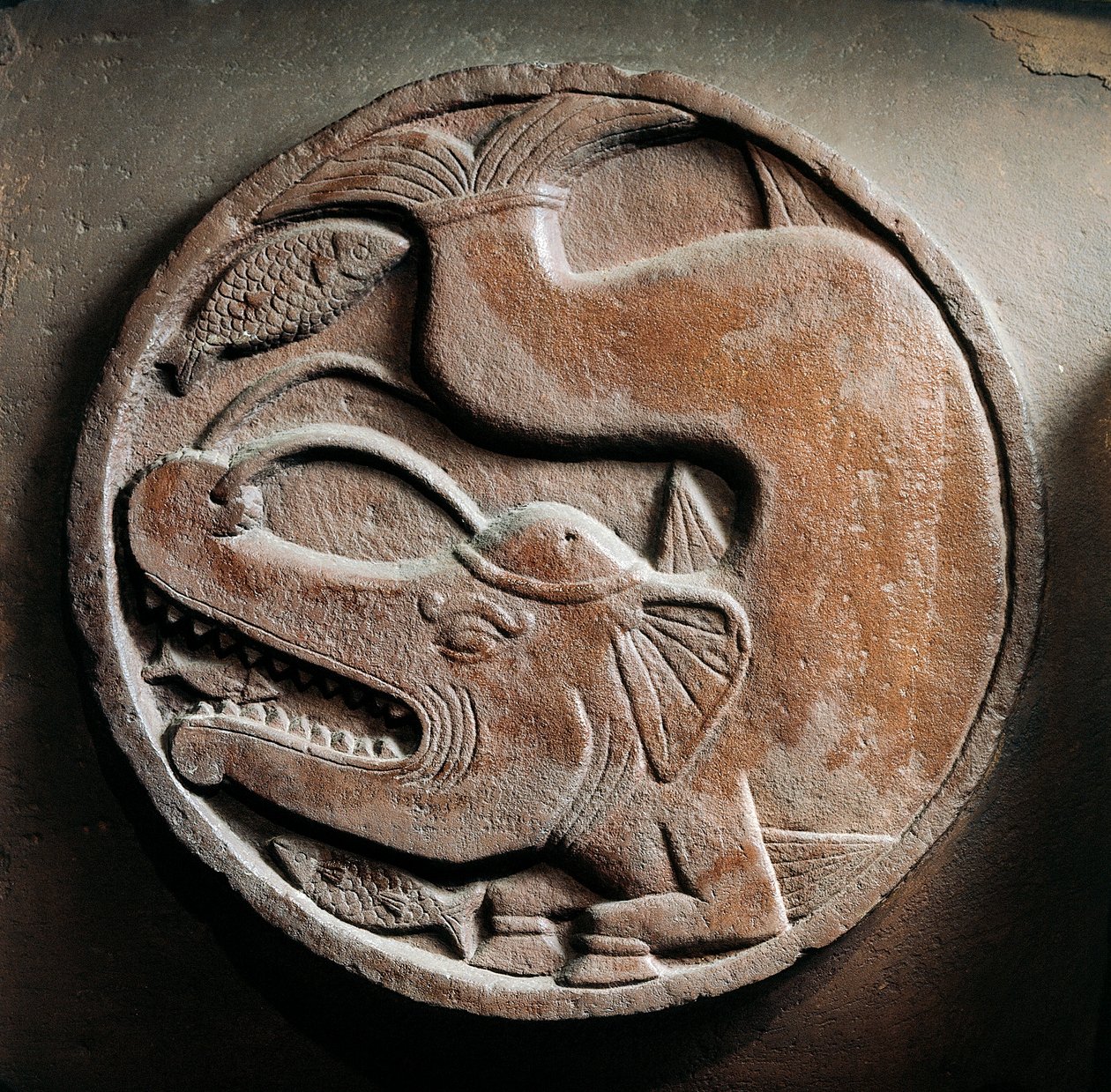 Médaillon avec animal marin de la tête d
