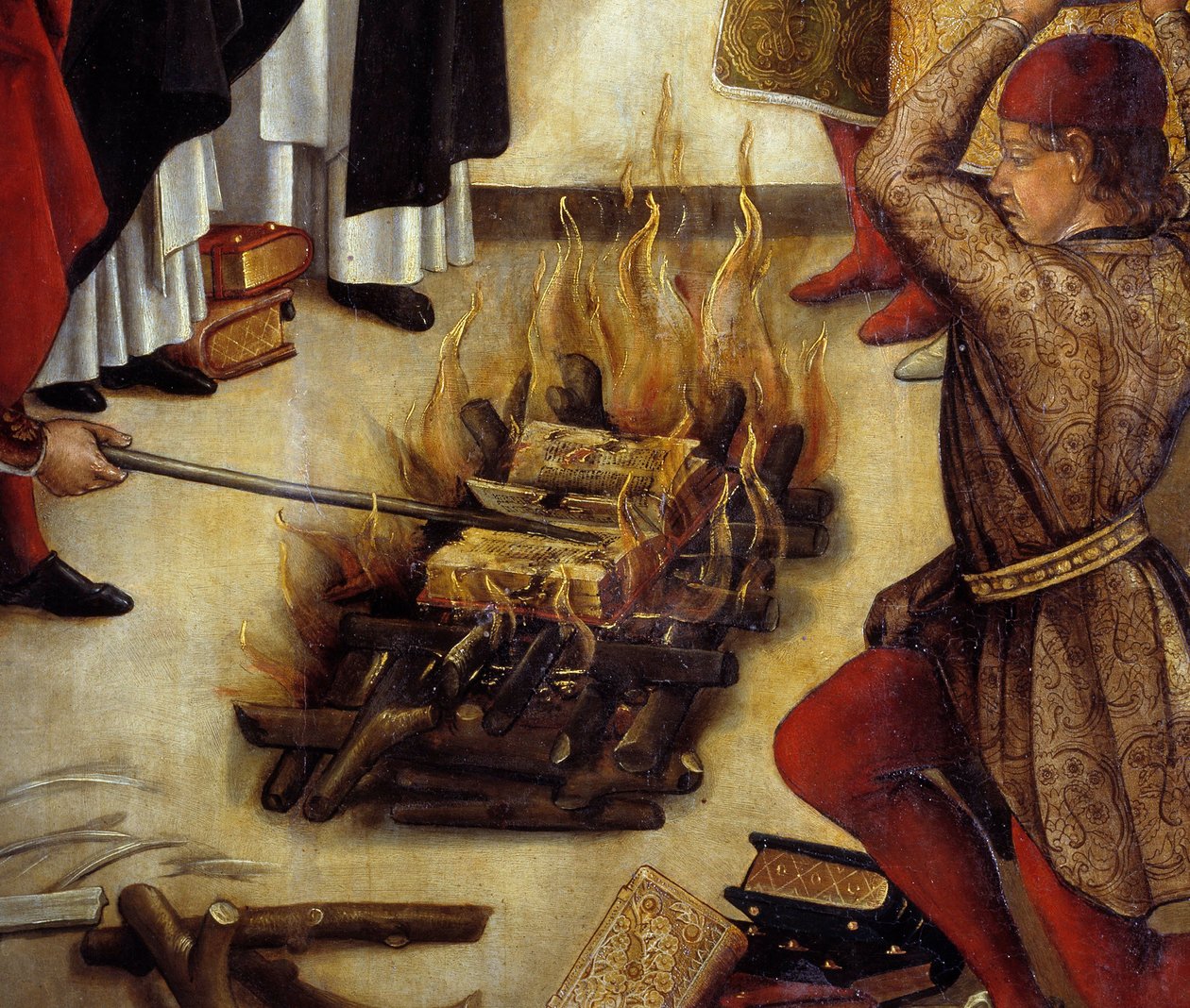 Détail de « Saint Dominique et les Albigeois » (Le Miracle des Fanjeaux) : le saint donne aux Albigeois le livre réfutant leur hérésie et les Albigeois essaient de le brûler, sans succès. Peinture de Pedro Berruguete (1450-1504). 16ème siècle - Pedro Berruguete