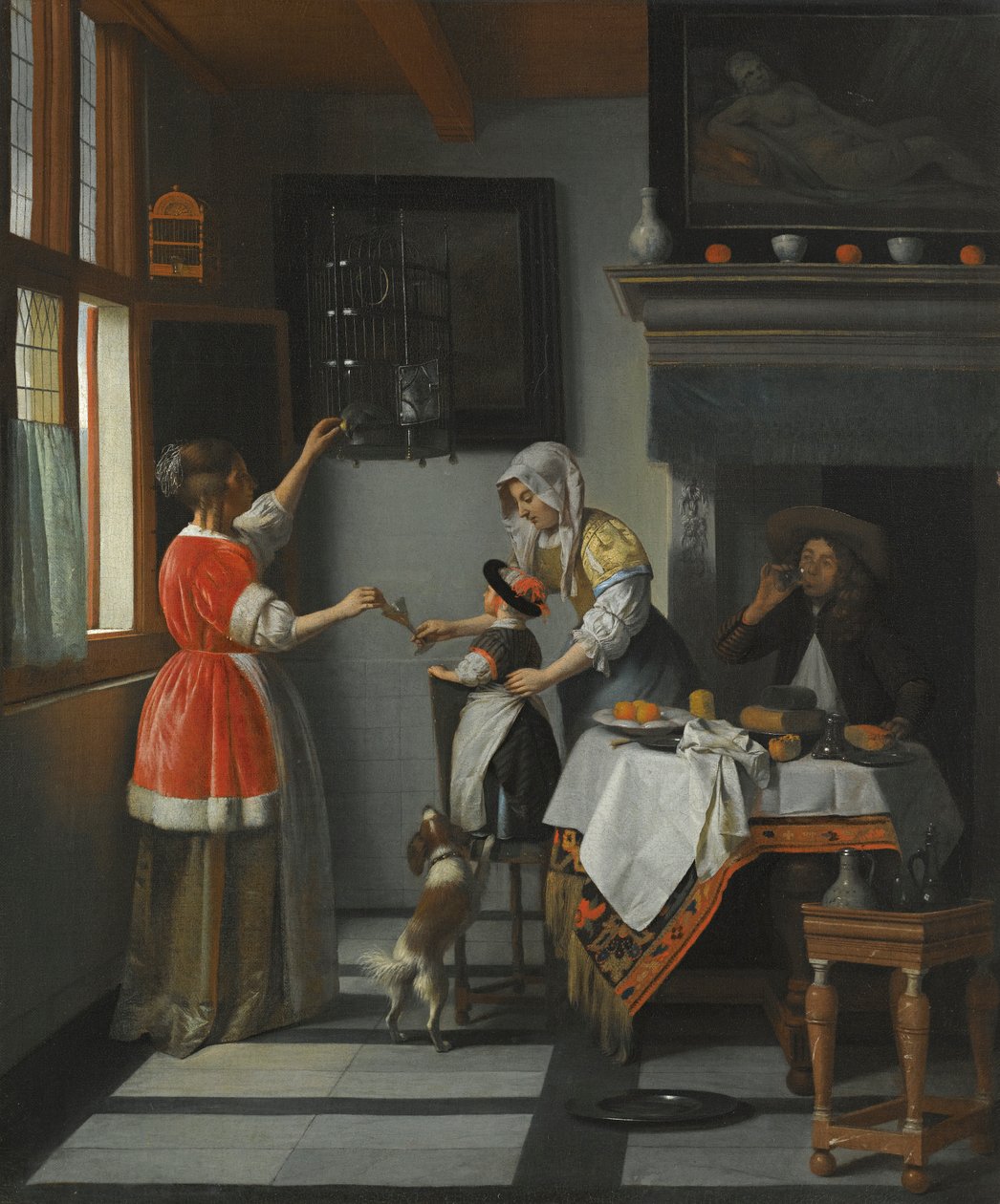Intérieur avec un enfant nourrissant un perroquet - Pieter de Hooch