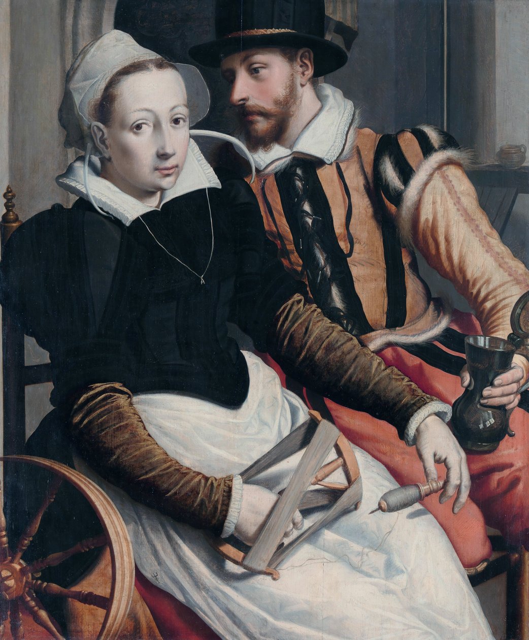 Une femme au rouet et un homme avec une chope assis à l