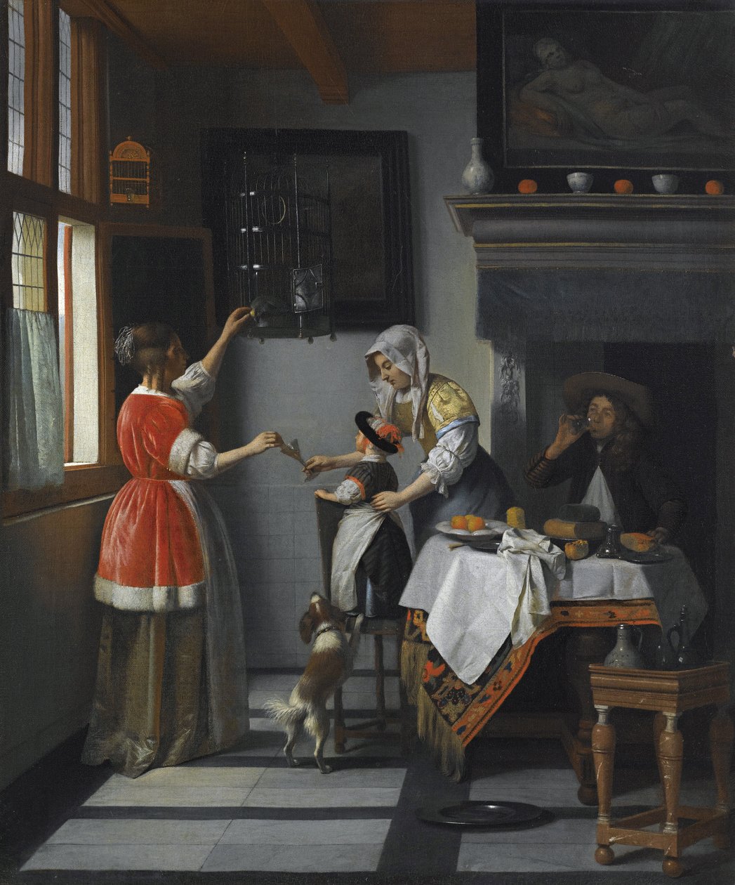 Intérieur avec un enfant nourrissant un perroquet - Pieter de Hooch