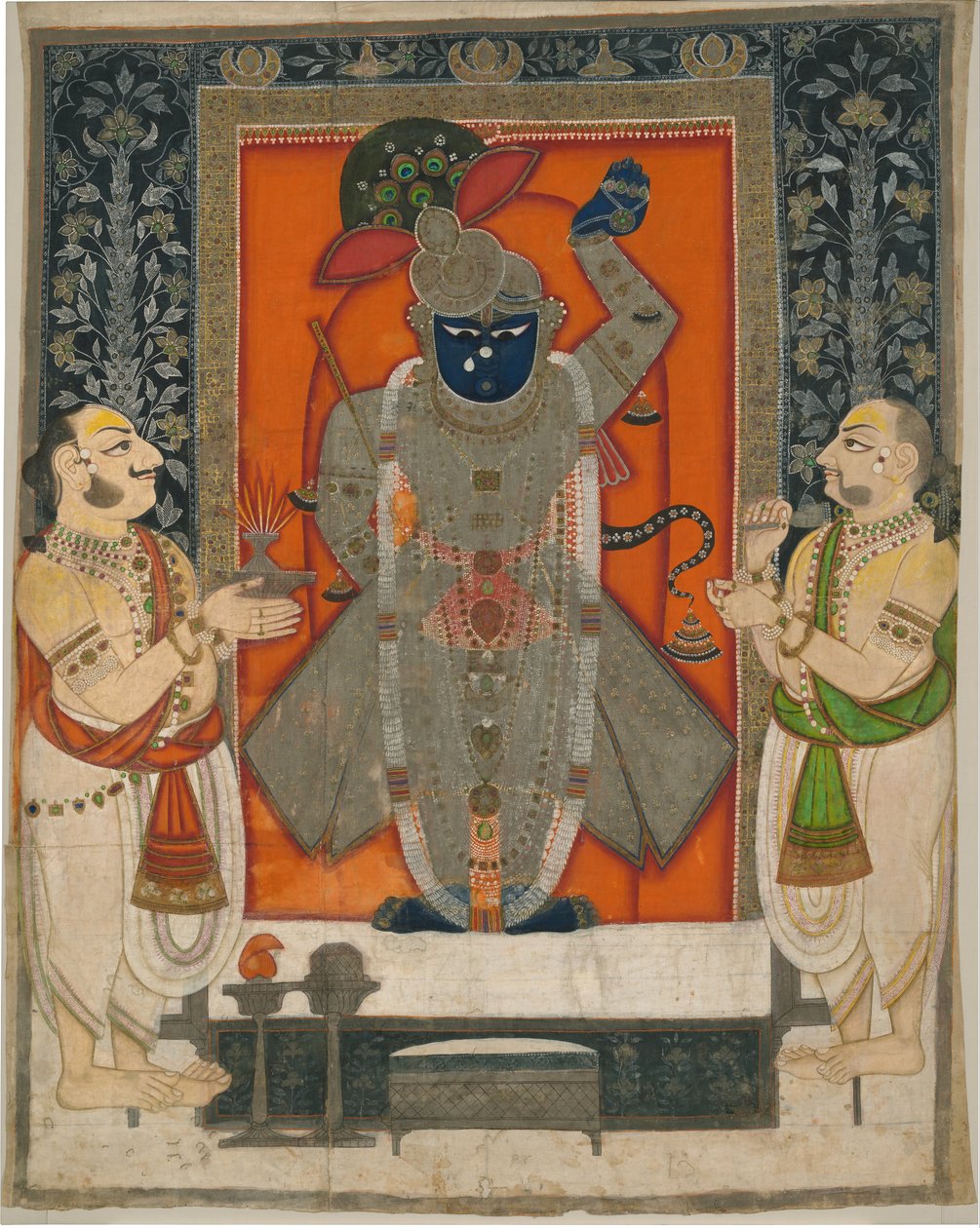 Prêtres adorant Krishna en tant que Shrinathji pour le festival de la Montagne de Nourriture [Annakuta utsava]; tenture de sanctuaire [pichhavai] - Rajasthan Kota school