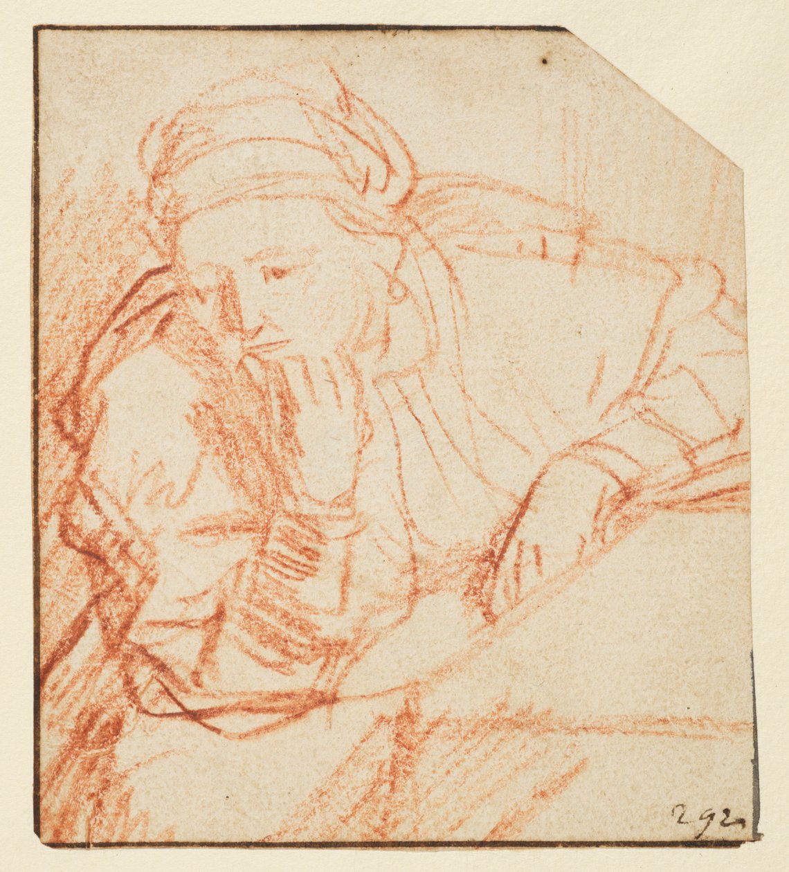 Saskia assise à une table - Rembrandt van Rijn