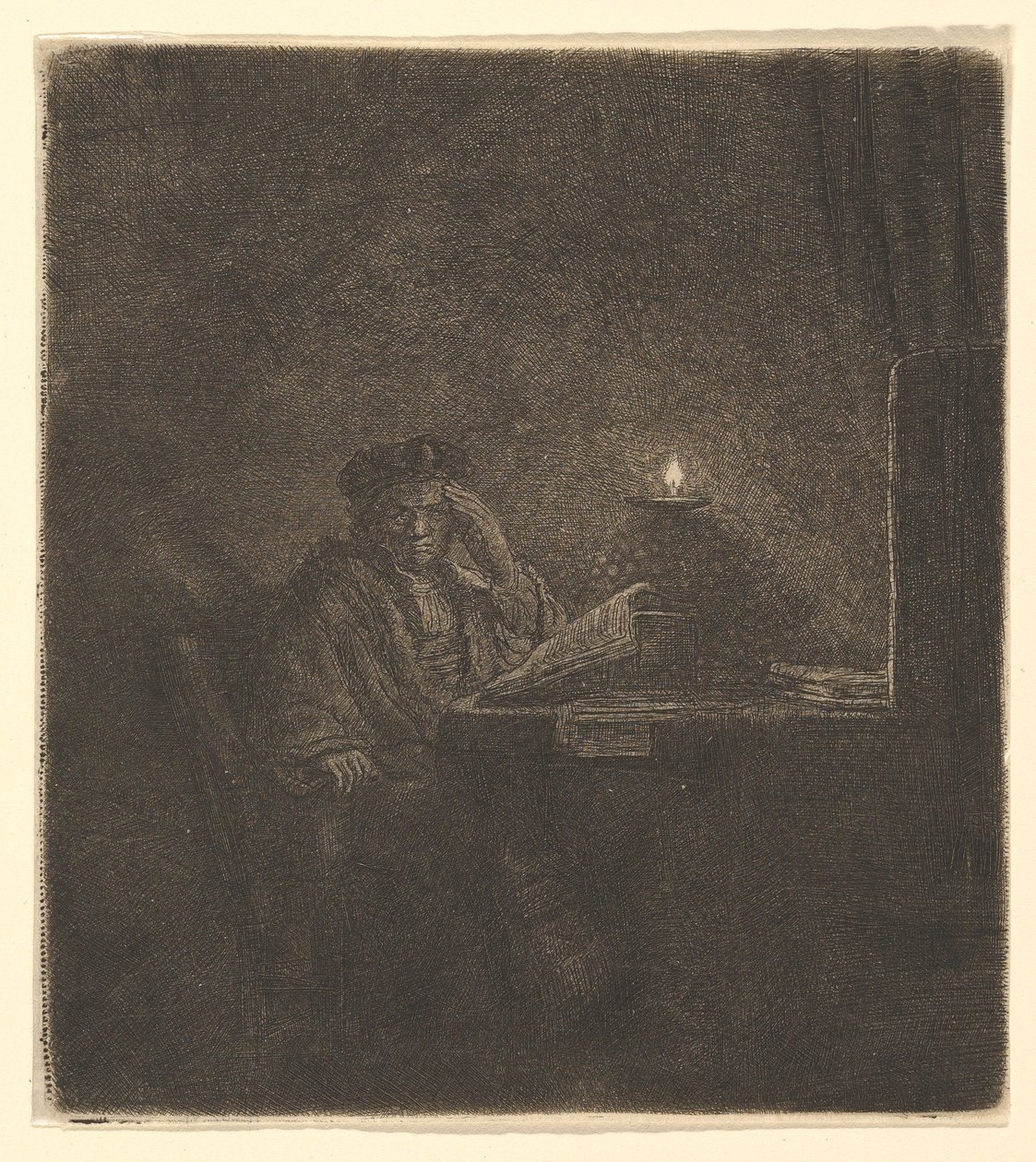 Étudiant à une table à la lumière d