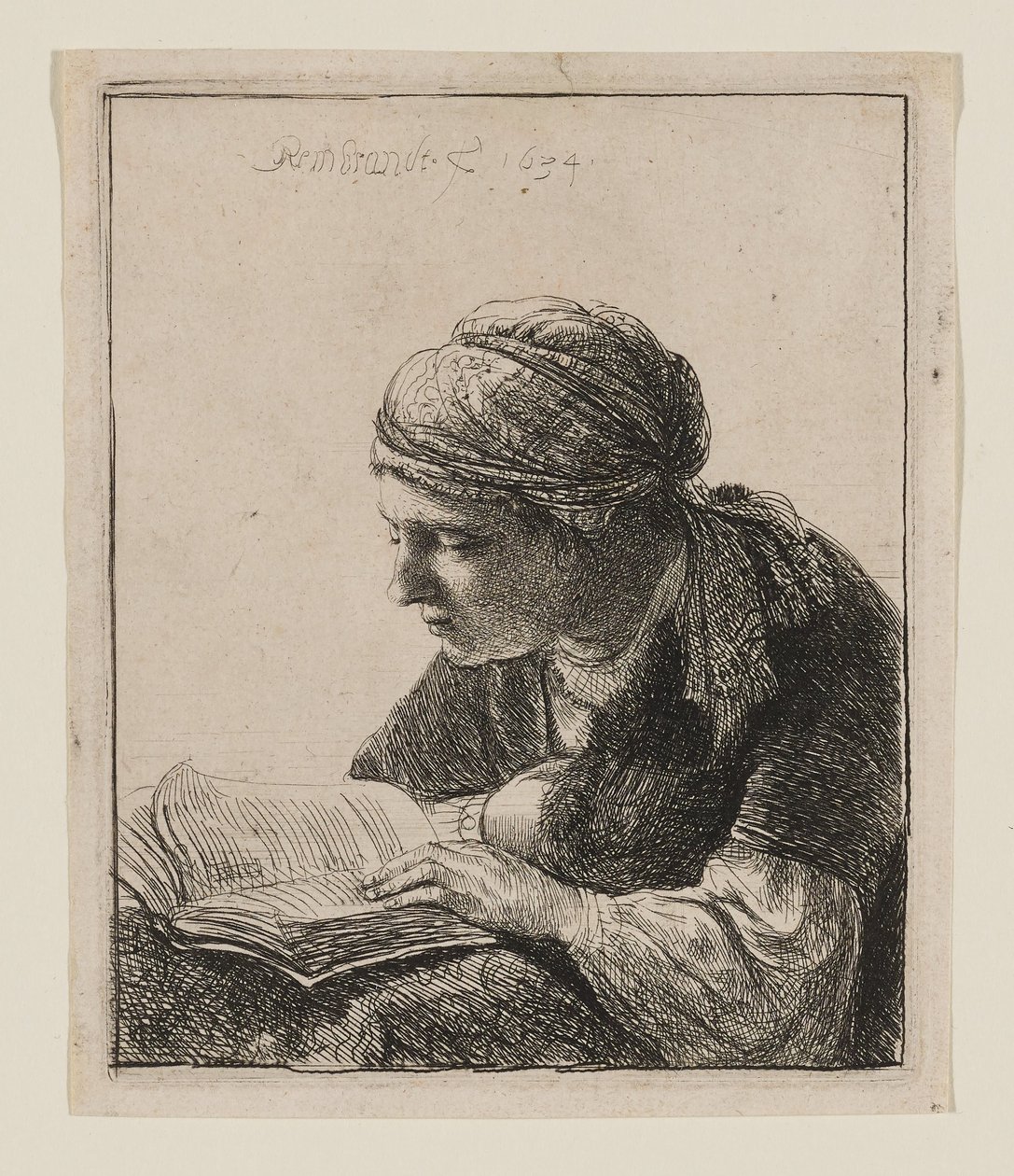 Une femme en train de lire - Rembrandt van Rijn
