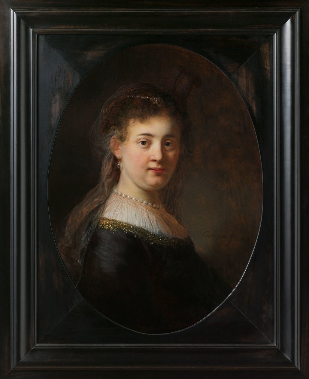 Jeune femme en costume fantastique - Rembrandt van Rijn