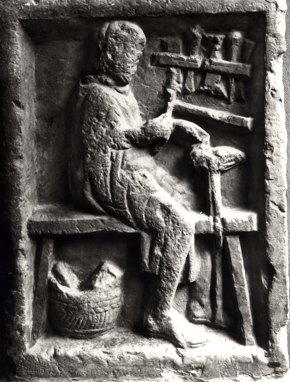 Cordonnier au travail, relief d