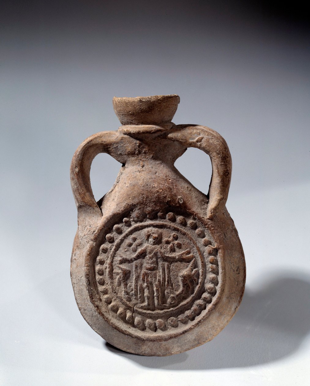 Art romain : ampoule en terre cuite avec pied représentant un saint - Roman