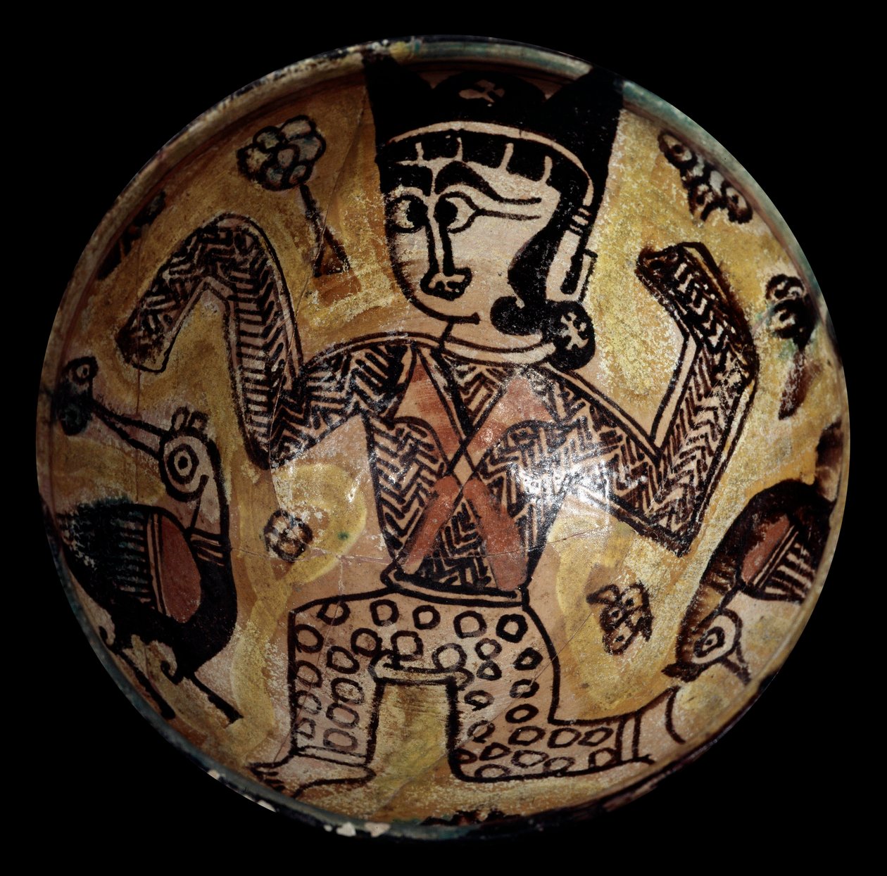 Art persan : coupe en terre cuite avec un personnage et deux oiseaux. Collection privée - School Persian
