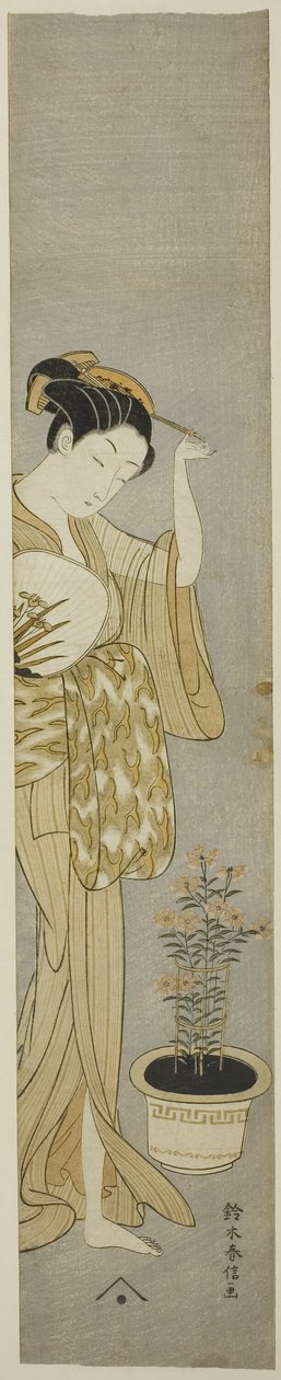 Beauté ajustant sa barrette - Suzuki Harunobu