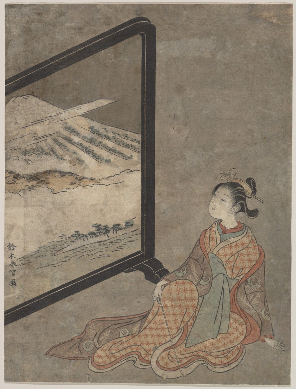 Jeune femme tenant une pipe et contemplant un paysage peint sur un paravent - Suzuki Harunobu
