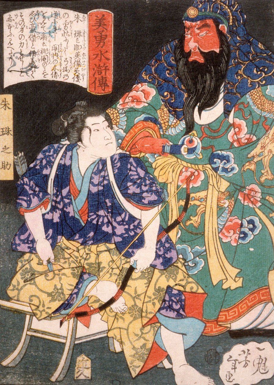 Ake Tamanosuke assis près de la statue d