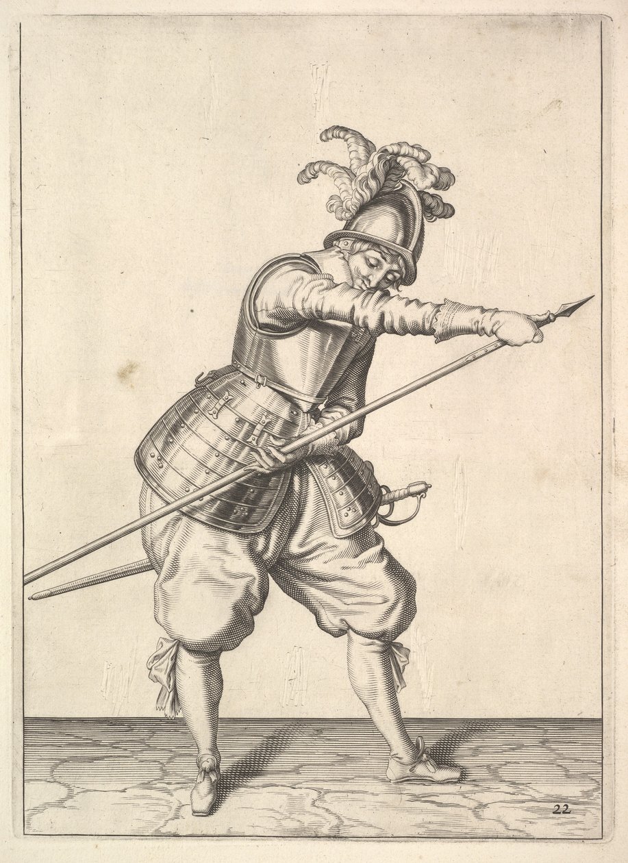 Un soldat glissant sa main droite le long de la pique d