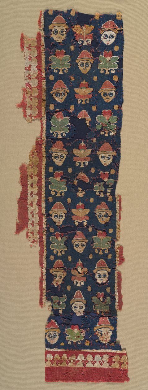 Bordure de têtes et palmettes d