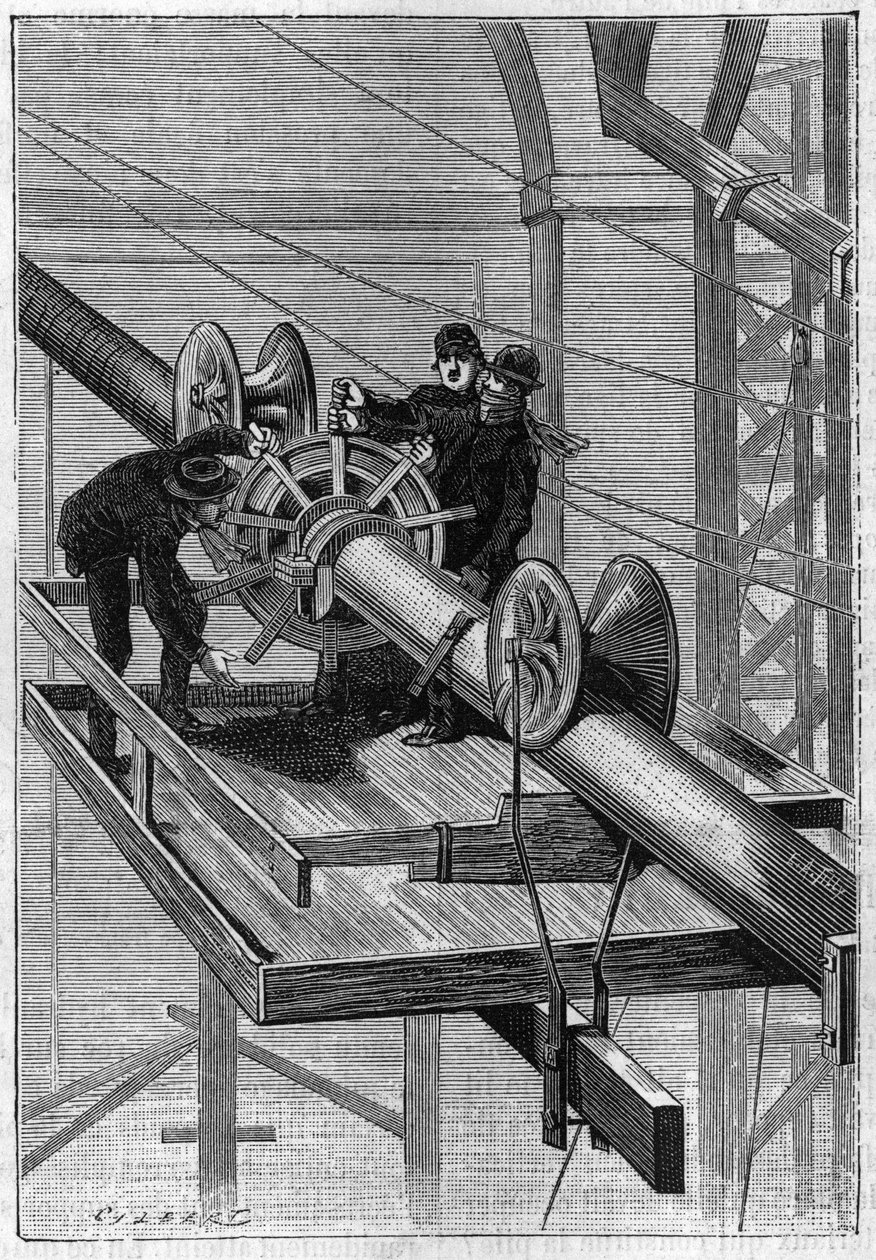 Construction du pont de Brooklyn à New York : Machine utilisée pour couvrir les 19 câbles secondaires avec du fil d