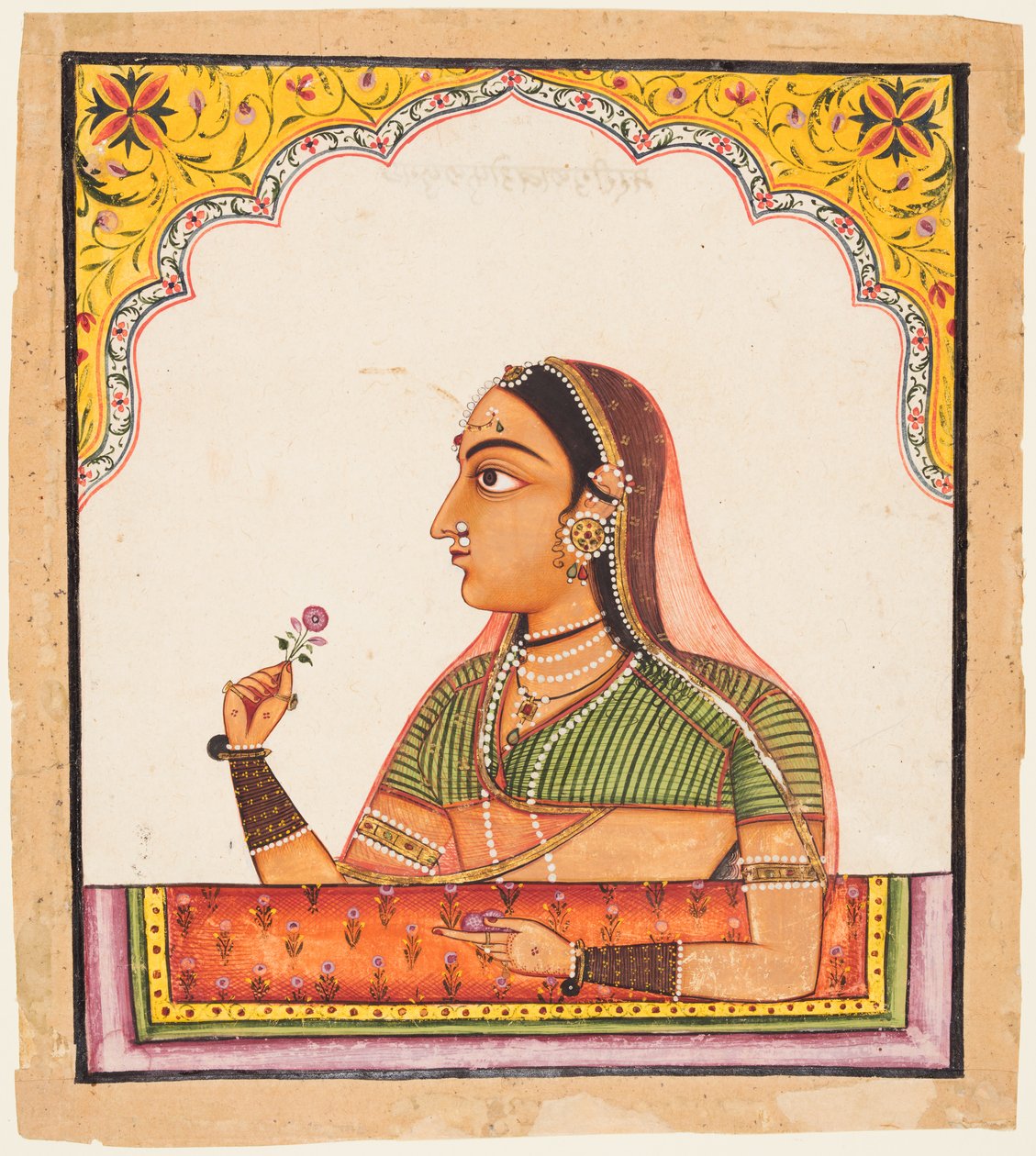 Noble femme à une fenêtre Jharokha tenant une rose, d