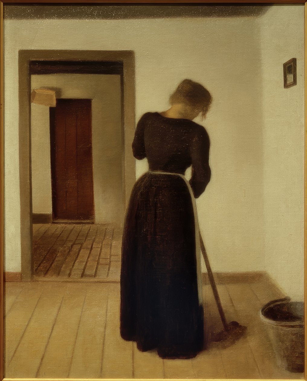 Intérieur avec une jeune femme balayant - Vilhelm Hammershoi