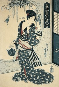 Jeune femme tenant une théière