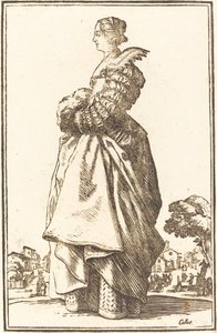 Femme noble de profil avec les mains dans un manchon