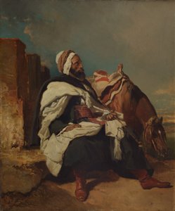 Homme arabe assis avec cheval