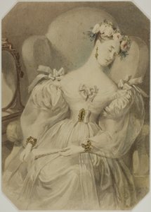 Femme en robe de soirée endormie dans un fauteuil
