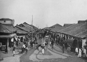 Scène de rue typique dans les quartiers indigènes, Colombo, vers 1890, 1910