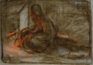 Femme assise devant le feu