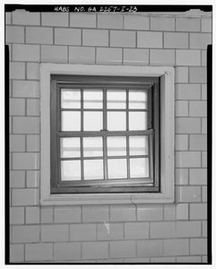 Détail typique de fenêtre de cage d